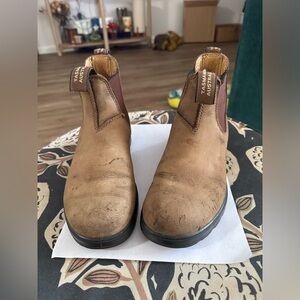 6.5 blundstones. They run small, because I wear a 6.5 but are snug.